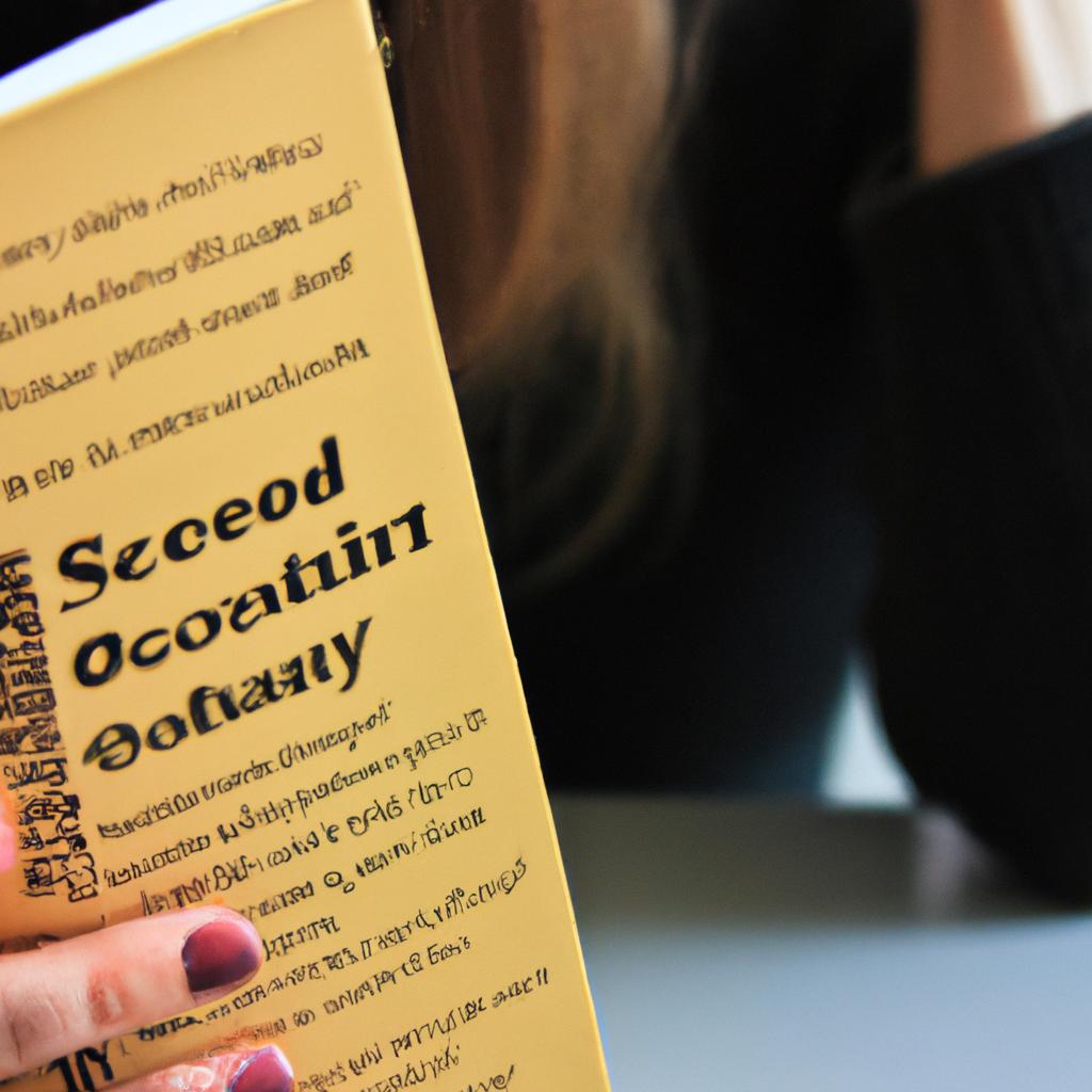 Woman reading book on sociology